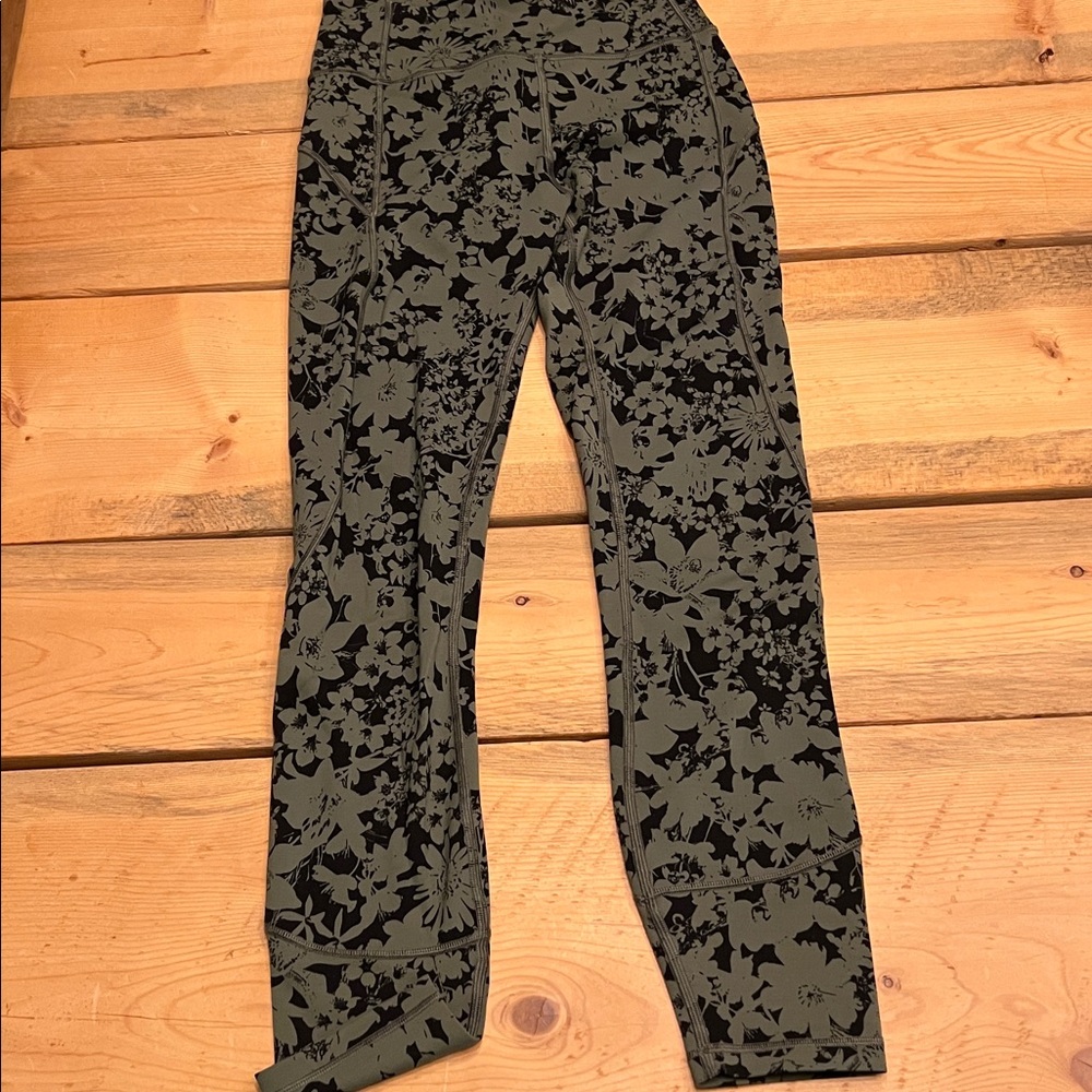 Lululemon In Movement Green and Black Floral Leggings Size 4